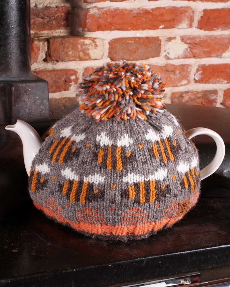 Bee design wool tea cosy with pom pom 