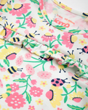 Sleepsuit with pink yellow and green all over nature print