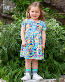 Patchwork planet dress in bright colours with flower design all over 