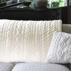 Cream knitted throw and cushion 