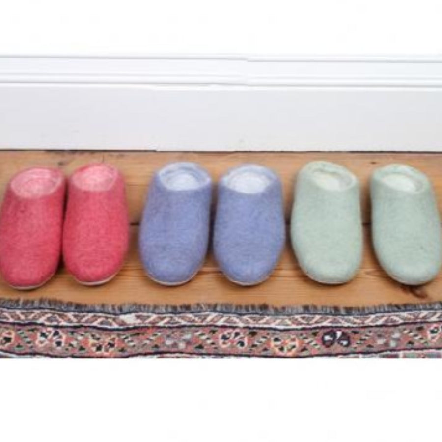 3 pairs of felted slippers in pink blue and mint green colour.