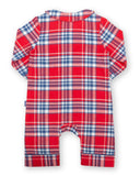 Plaid romper in red blue and white with wooden buttons. 