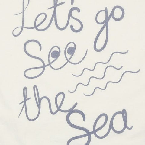 White short sleeve organic cotton tshirt with lets go see the sea printed across the front